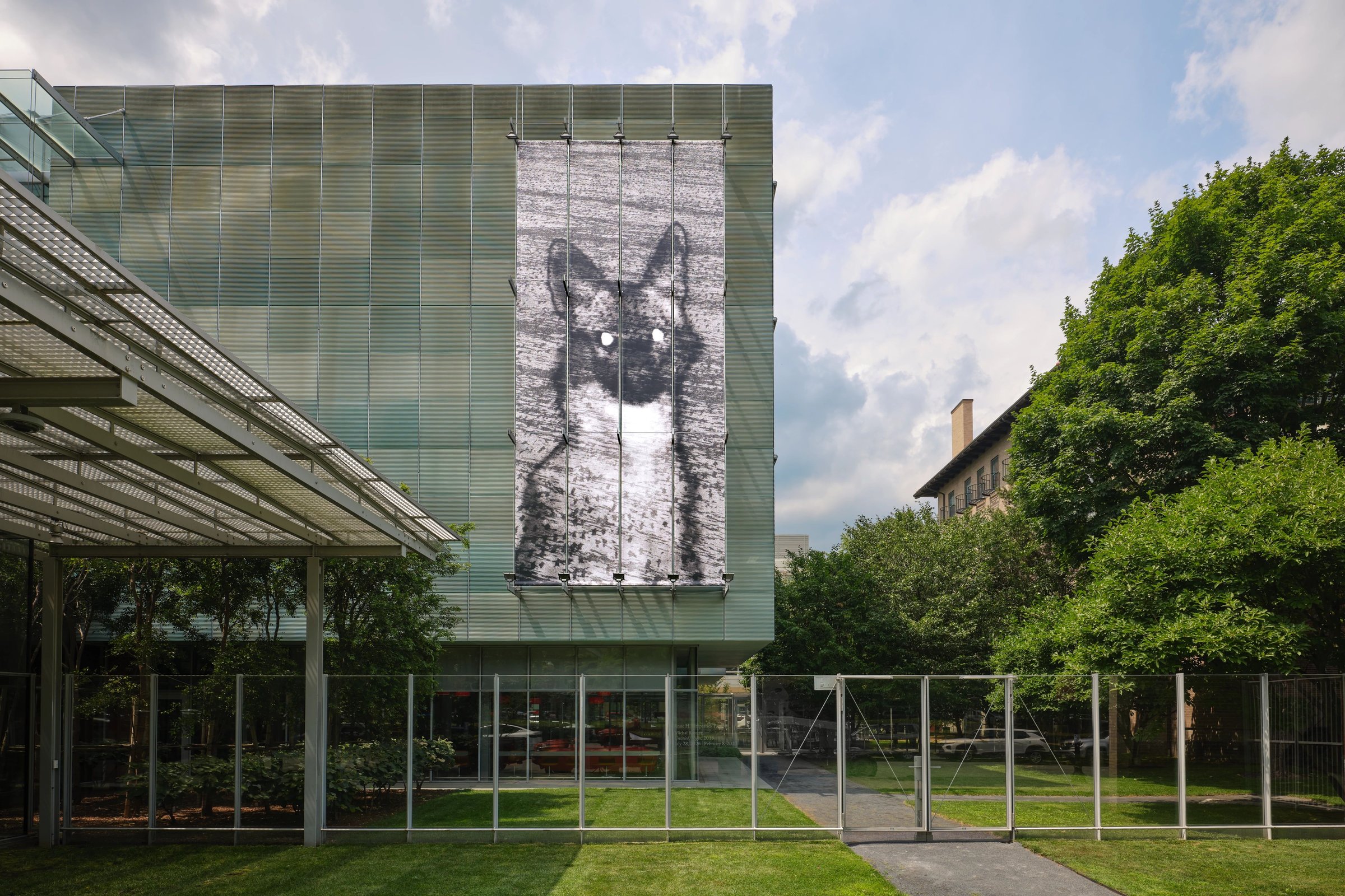 Gardner Museum façade showing a giant black-and-white image of a cat