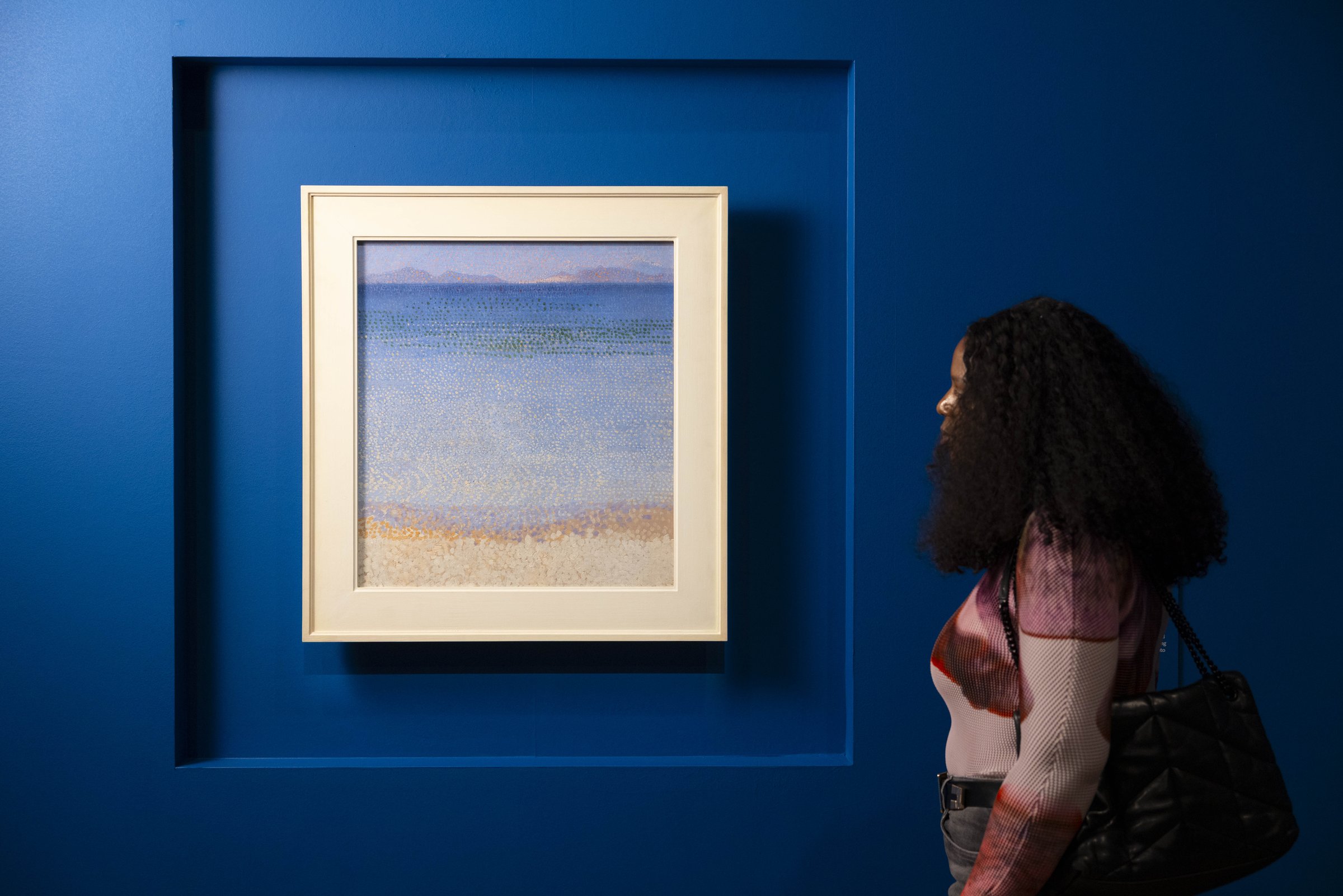 Painting the French Riviera at the Royal Academy of Arts, London: a pale seascape painting displayed in a wall niche