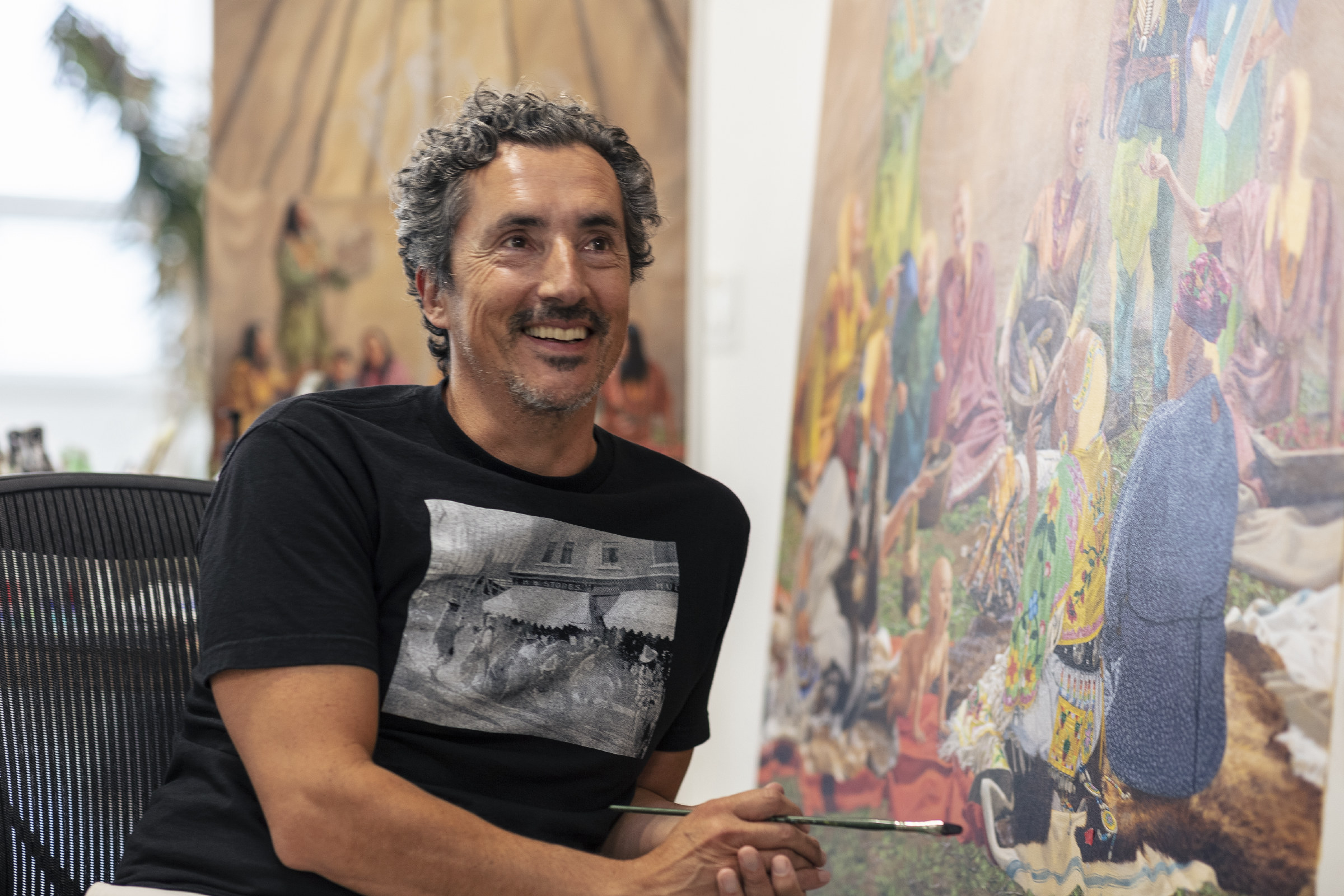Kent Monkman in his studio in 2022, preparing work for his Royal Ontario Museum exhibition Being Legendary.