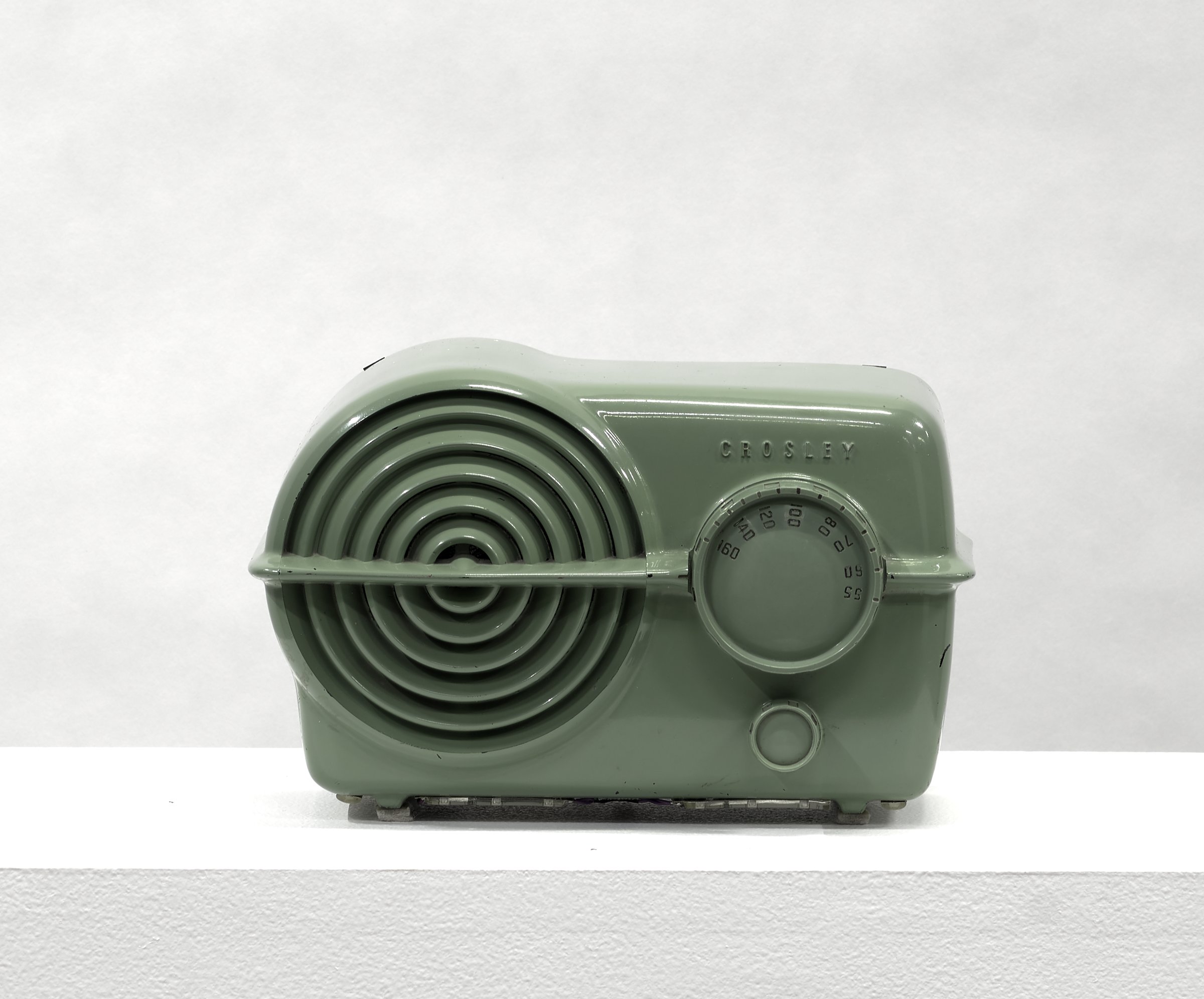 Constance DeJong sculpture: a mint green vintage Crosley radio on a white plinth