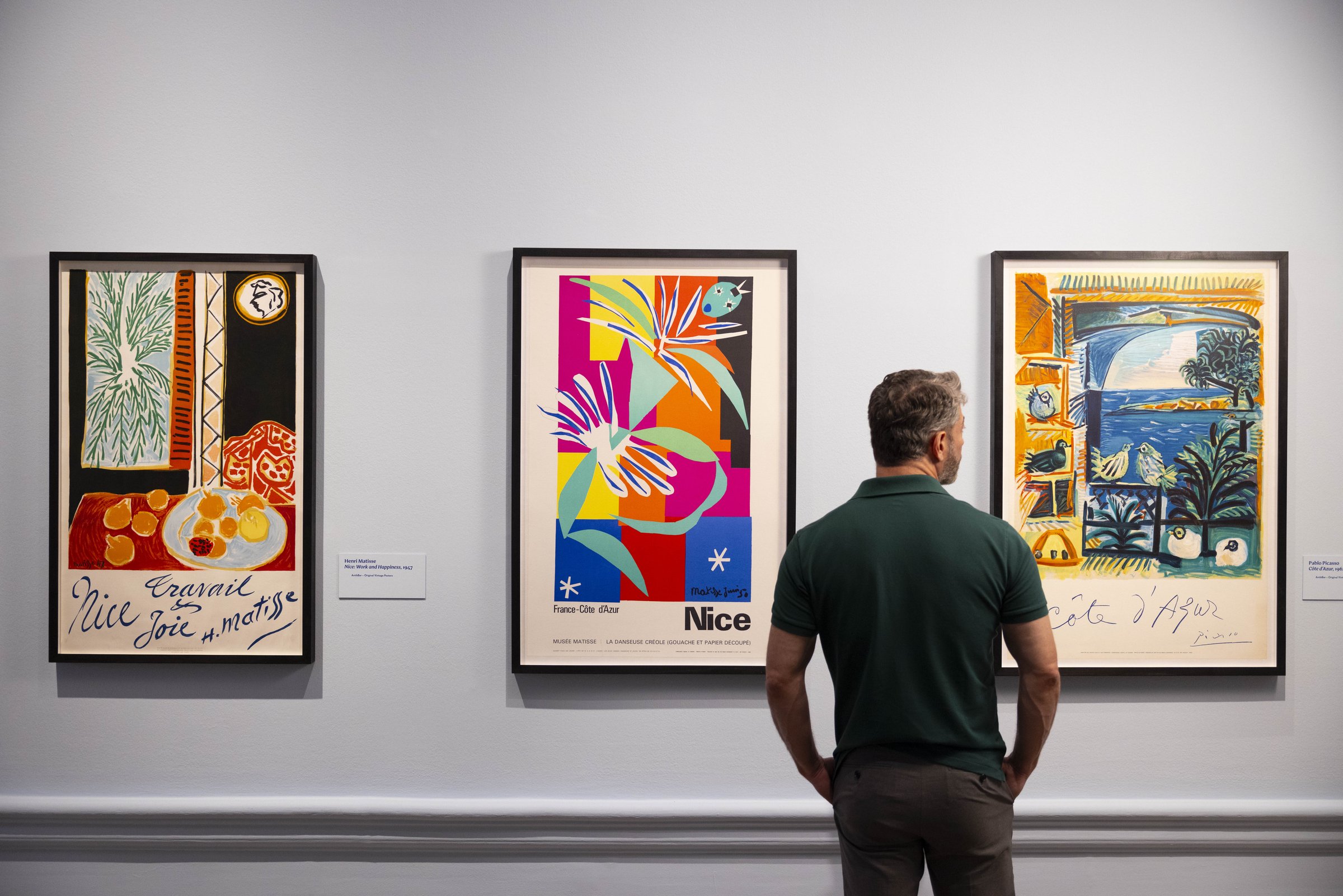 Painting the French Riviera at the Royal Academy of Arts, London: a wall of vintage Riviera travel posters
