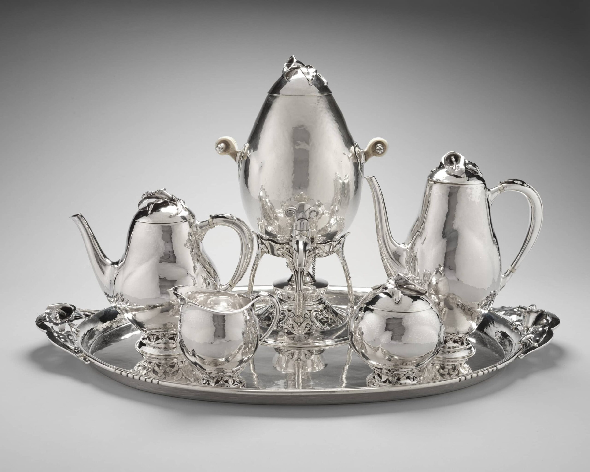 A silver coffee and tea set.