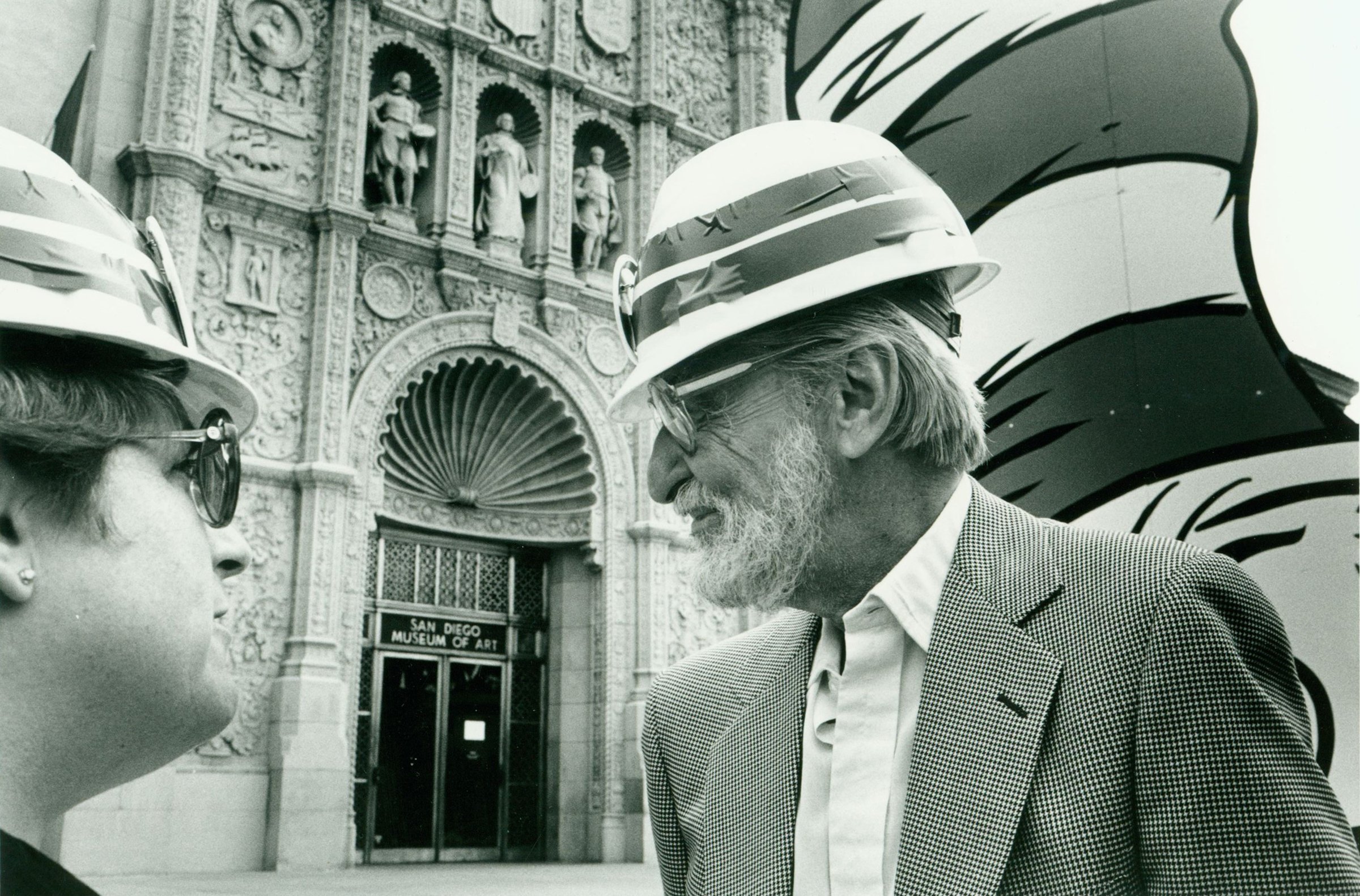 Theodore Geisel (Dr. Seuss) in a hard hat during the 1986 Cat in the Hat cornice installation