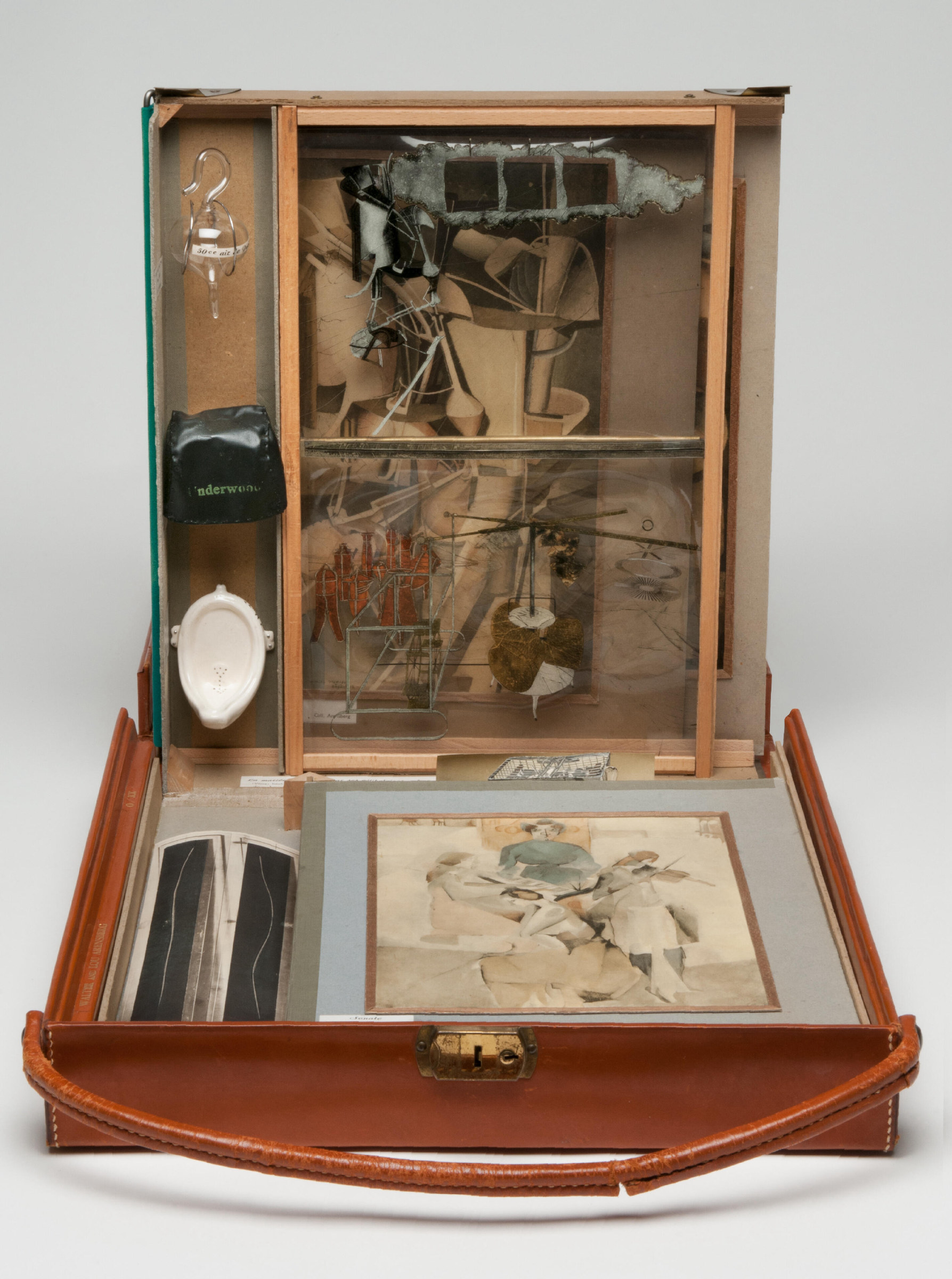 Marcel Duchamp, Box in a Valise: a leather case opened to show miniature replicas and reproductions of his works