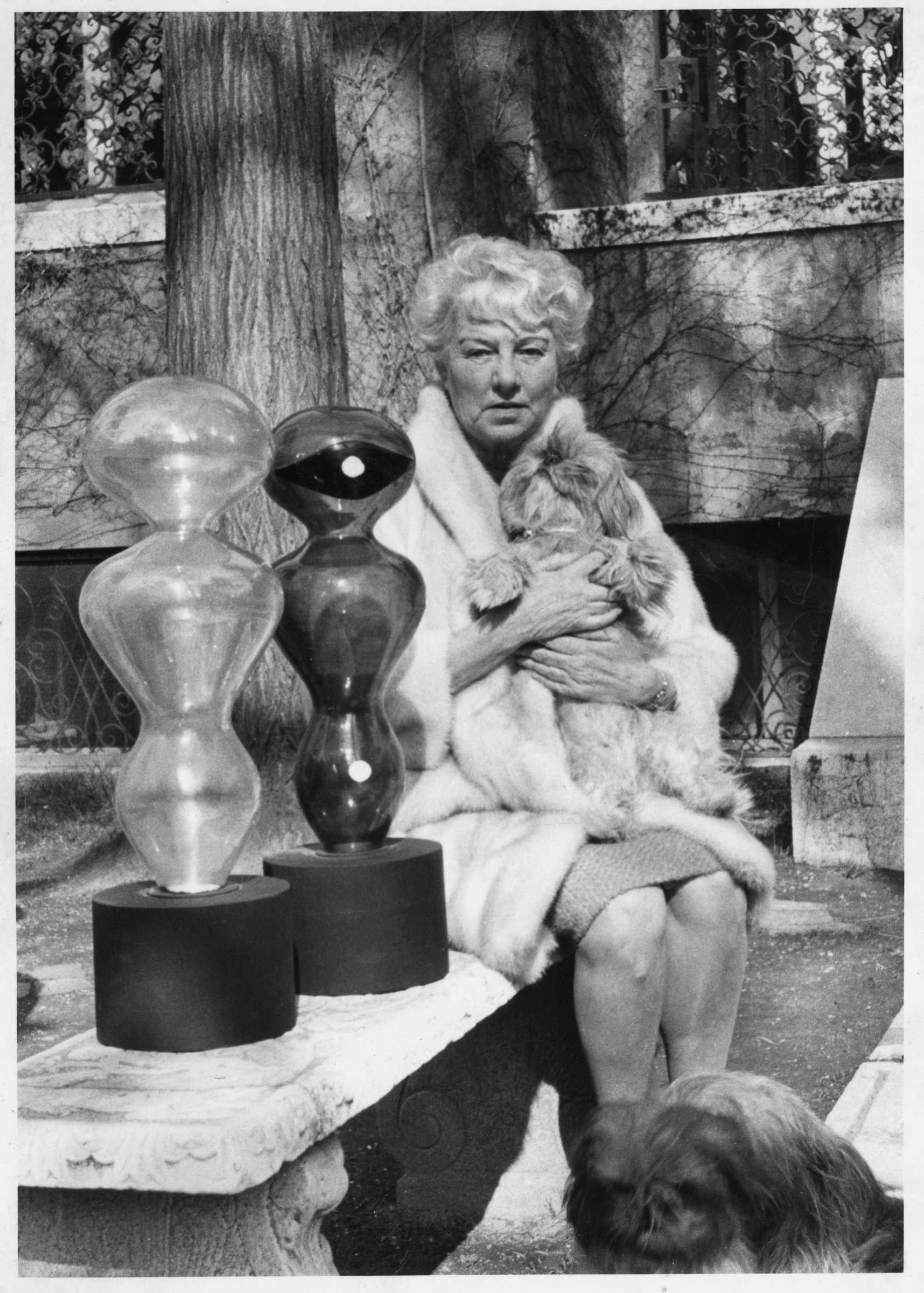 Peggy Guggenheim in the garden of Palazzo Venier dei Leoni with Arp’s Bride and Groom, about 1965