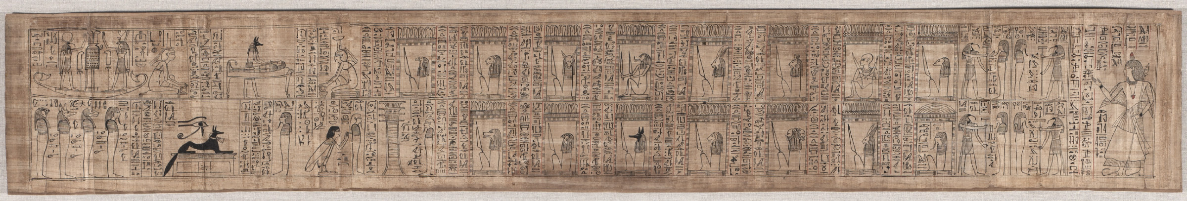 A long horizontal strip of papyrus carrying a continuous register of small outlined figures and deities above bands of hieroglyphic text.