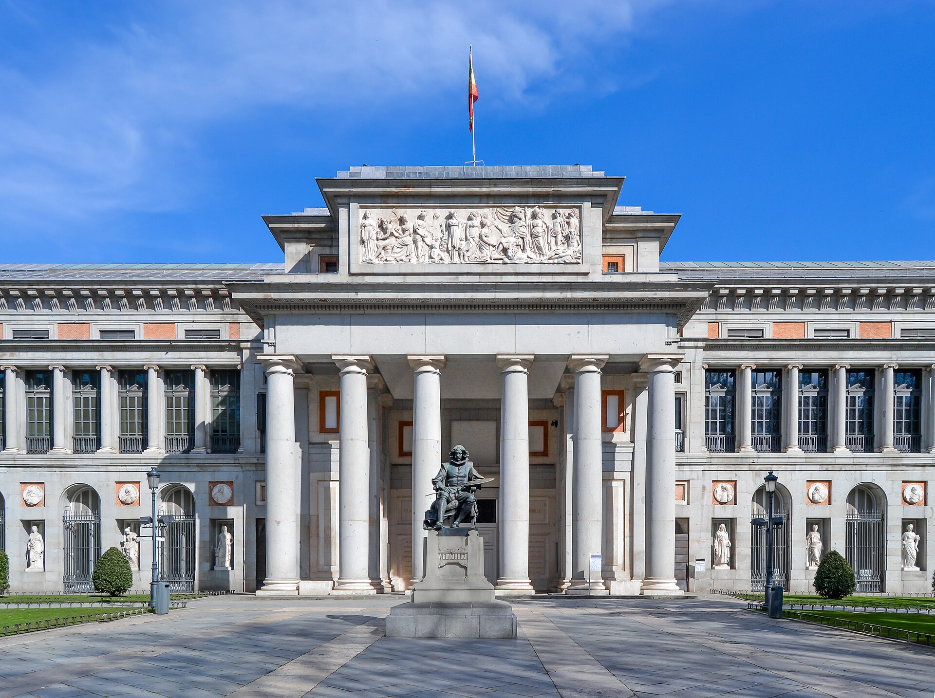 The Villanueva building of the Museo del Prado in Madrid, its columned portico facing the boulevard.