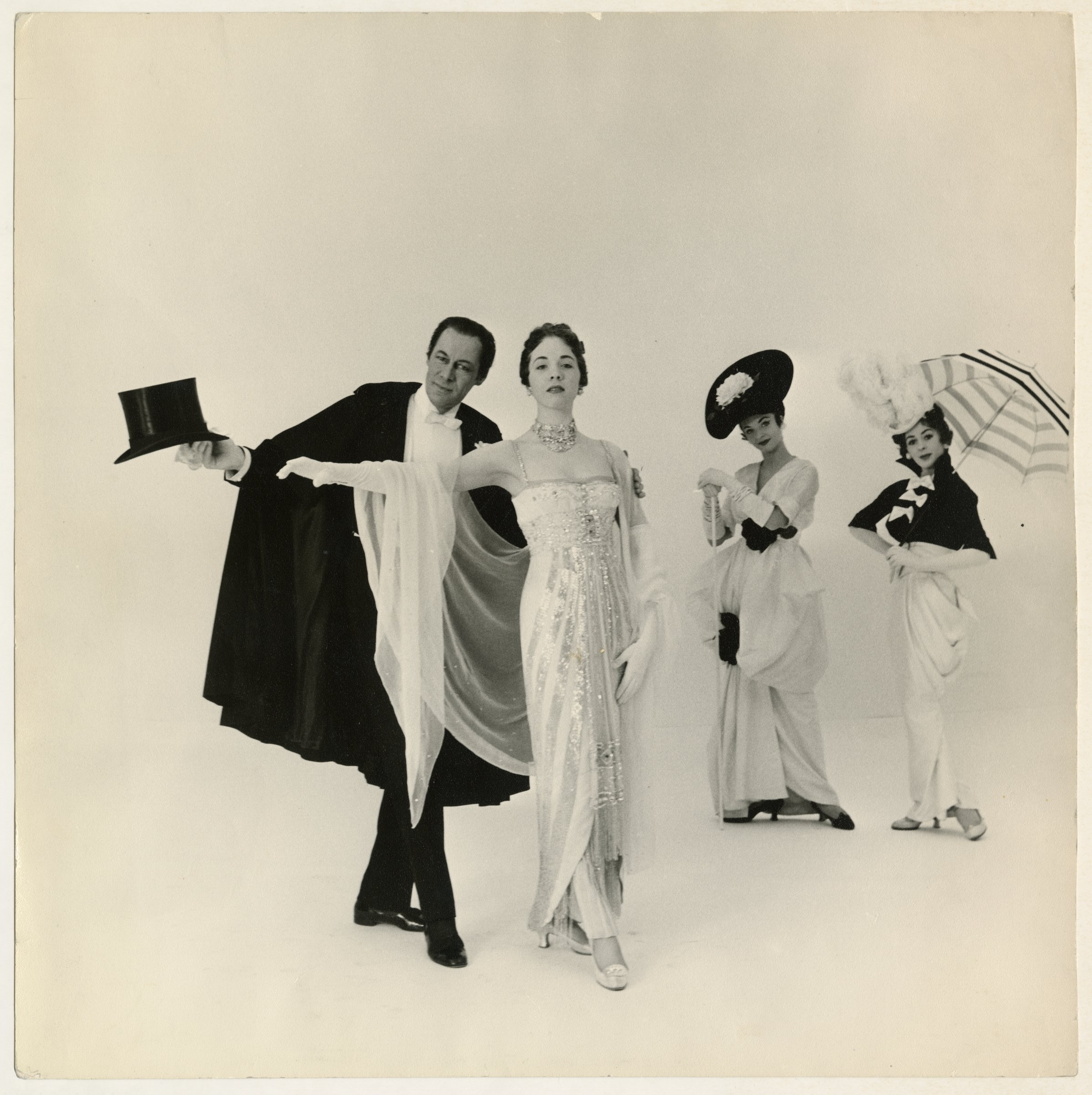 Cecil Beaton, Rex Harrison and Julie Andrews in costume for My Fair Lady: the cast in Edwardian costume and hats posed against a white backdrop