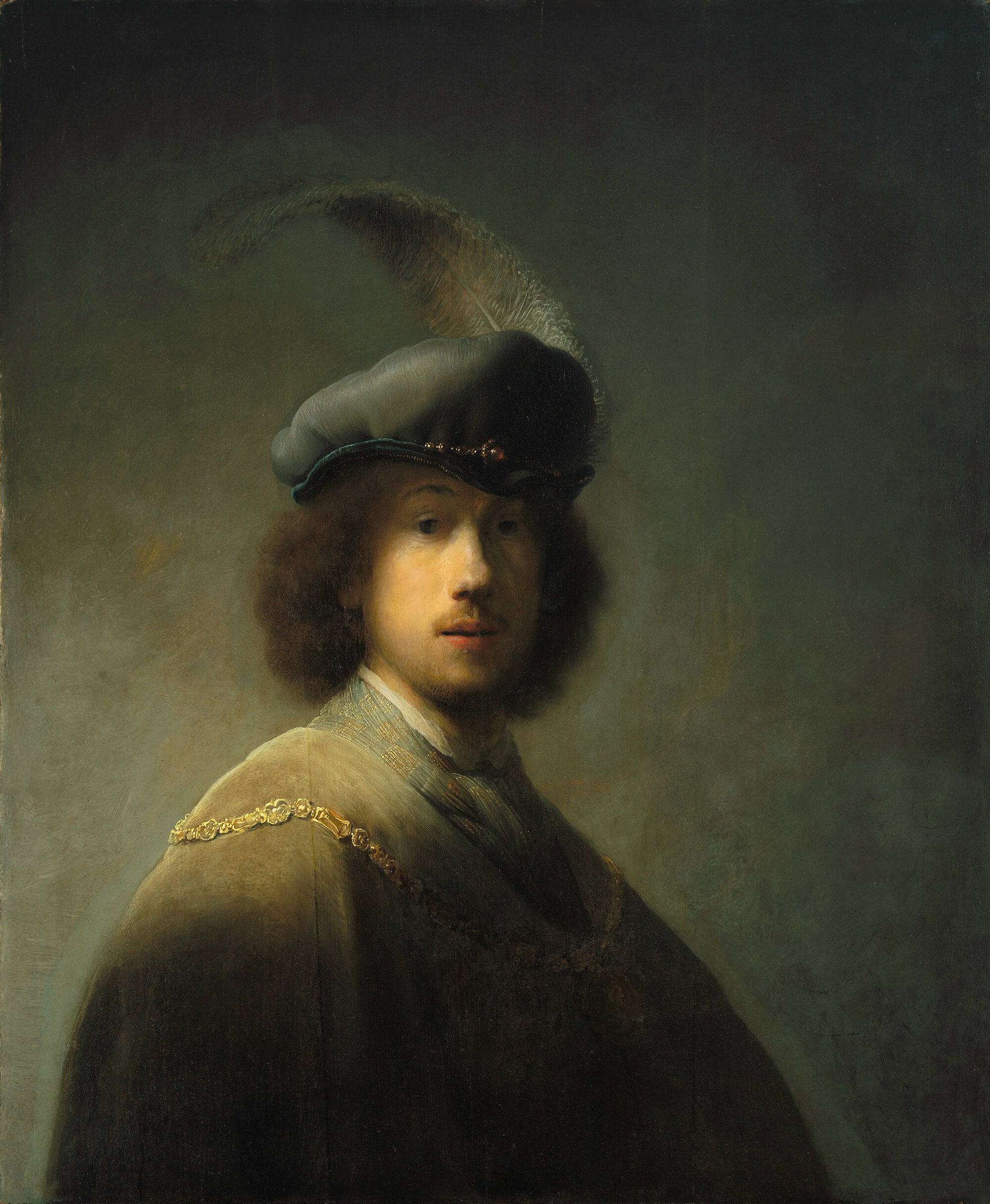 Rembrandt self-portrait as a young man in a feathered beret, face half in shadow