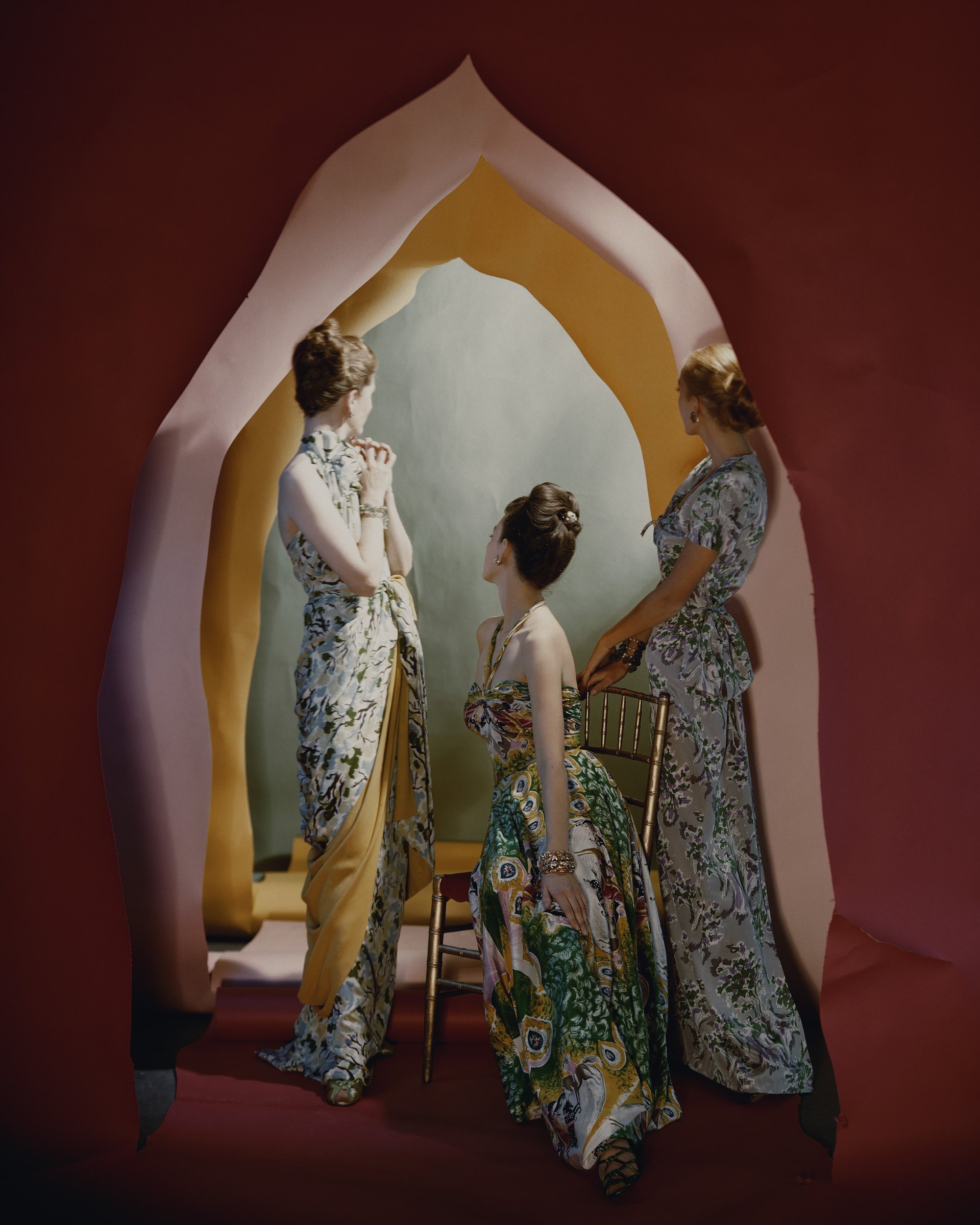 Cecil Beaton, Painters’ Print: three women in patterned printed dresses inside a stylized pointed arch