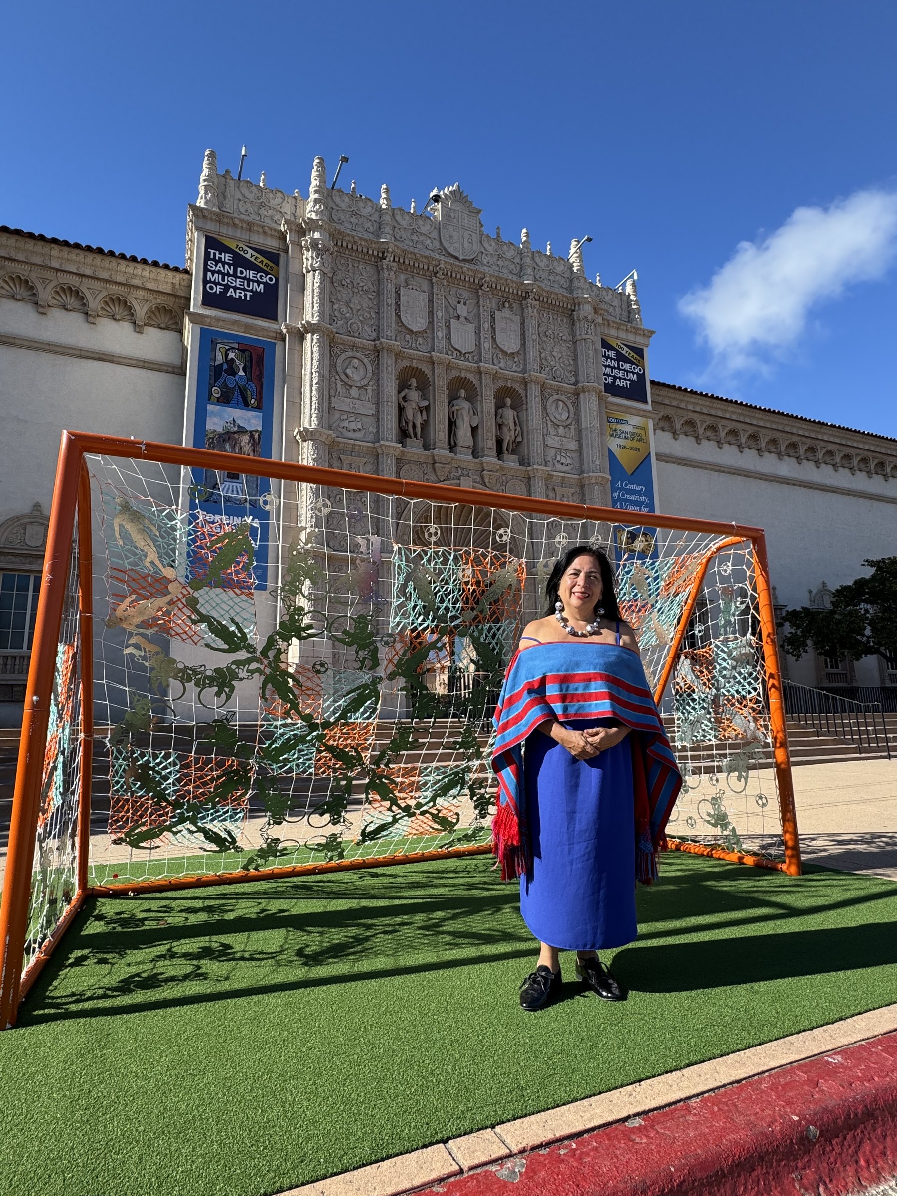 Betsabeé Romero, Tejiendo Redes: a woven net installation on a frame outside the museum’s ornate façade