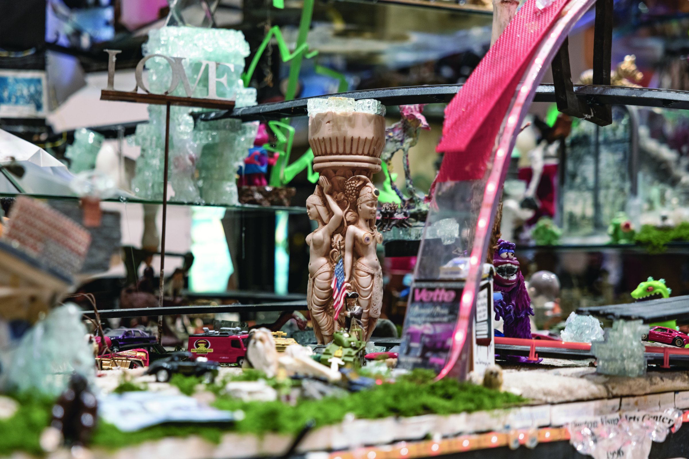 Close-up detail of Robert Blackstone’s Crystal City showing glittering miniature figures and structures