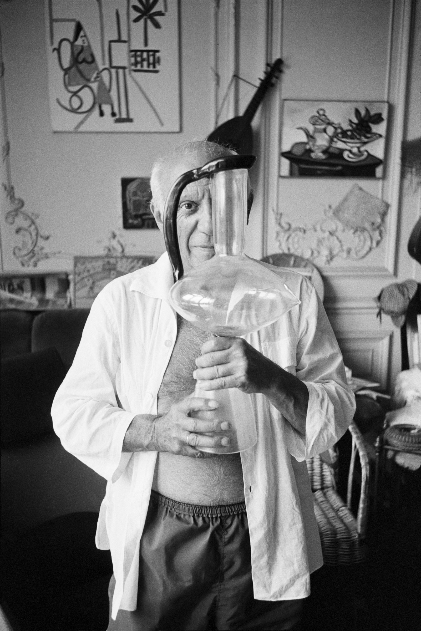 Pablo Picasso at home in Cannes with the glass Precious Amphora, 1961