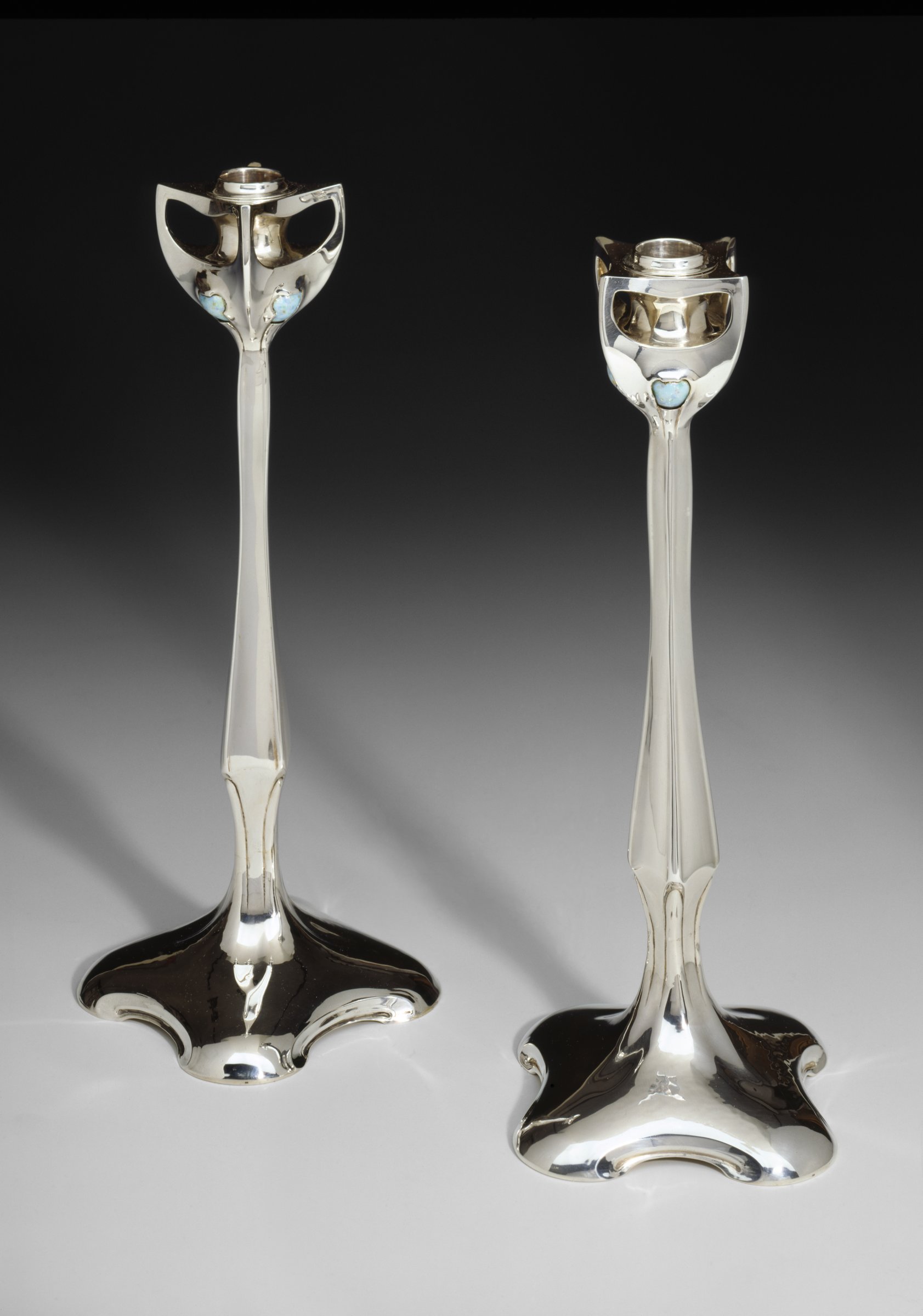 Henry van de Velde, pair of silver and enamel candlesticks, 1902