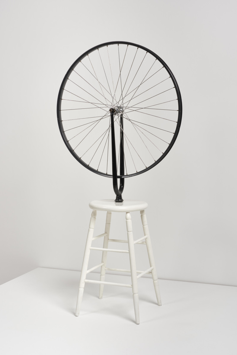Marcel Duchamp, Bicycle Wheel: a bicycle wheel mounted upside down on a white wooden stool