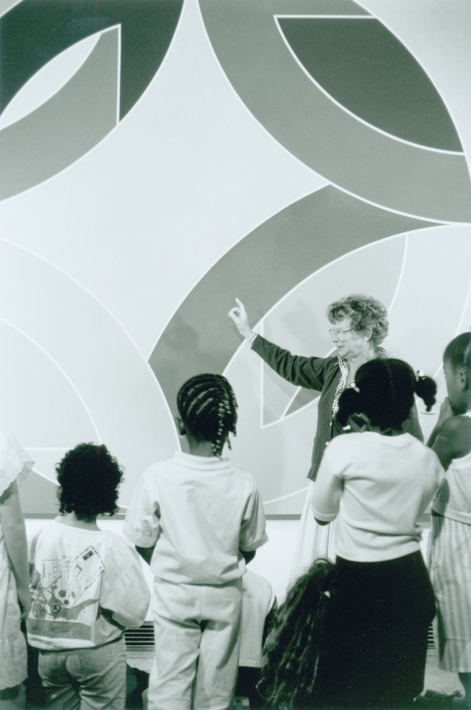 A docent leading a tour group at the Family Days Festival